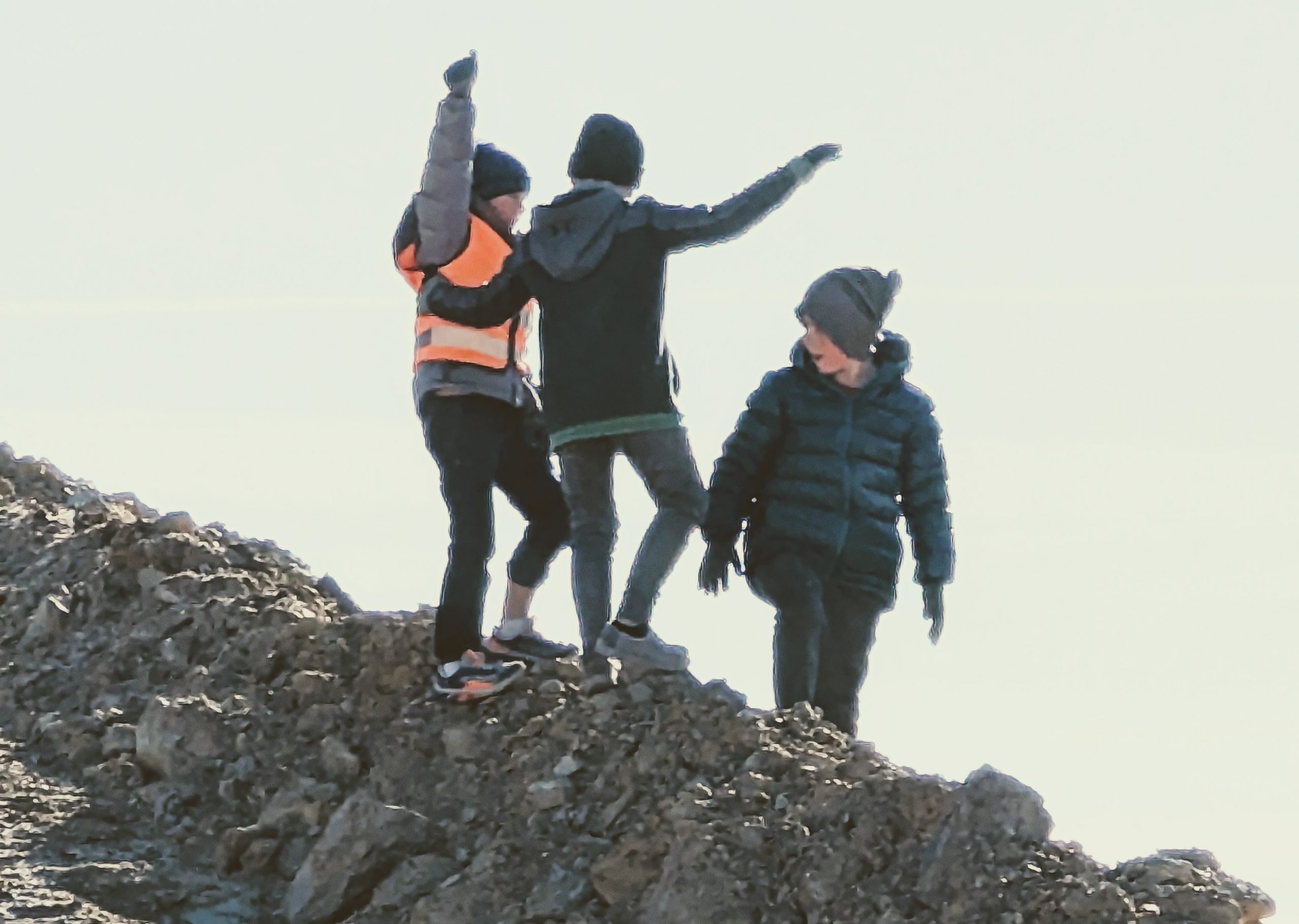 Boys climbed the dirt pile, which to them might as well have been Mount Everest.